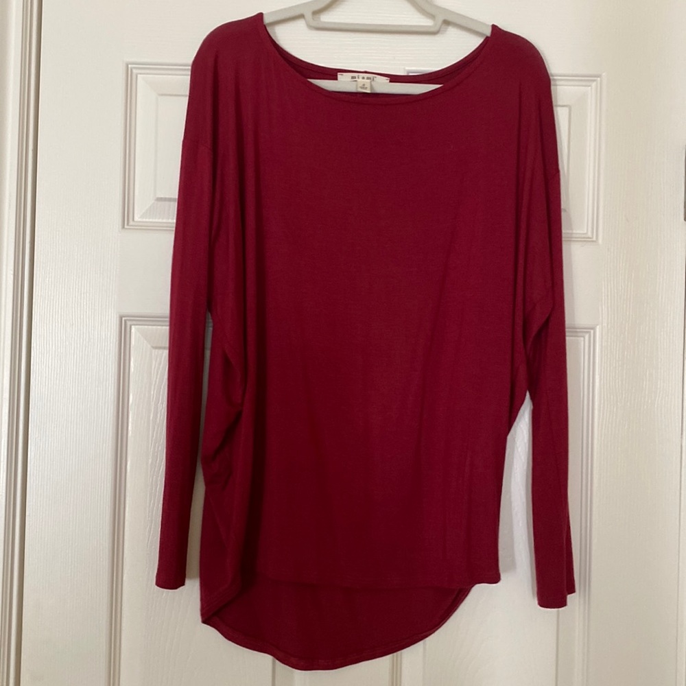Burgundy oversized long sleeve top.